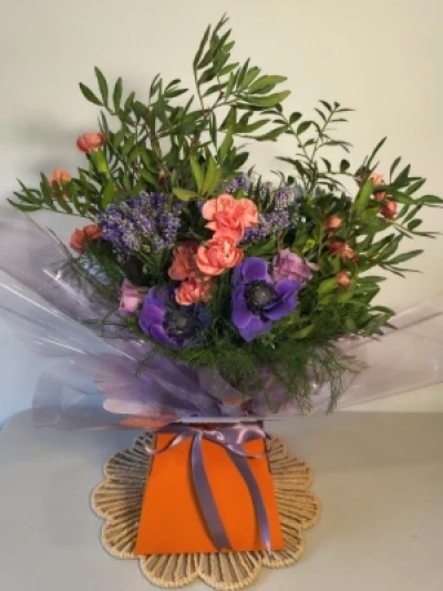 Tropical Twilight - Vibrant orange, rich purple, and deep blue blooms into a bold, atmospheric arrangement. With its sunset‑inspired palette and artistic depth, this bouquet brings a striking, colour‑soaked glow to any space — vivid, modern, and full of character.