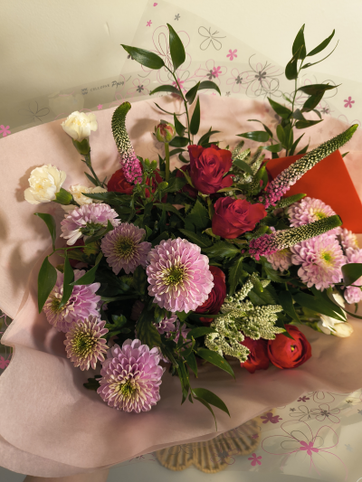 The Enchanted Heart - The Enchanted Heart blends soft pink and rich red blooms into a modern, romantic bouquet with a dreamy, delicate feel. Its gentle textures and warm tones create a sweet, elegant expression of affection — perfect for moments meant to feel intimate and unforgettable.
