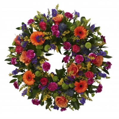Multi Coloured Wreath Loose - An elegant mixed wreath featuring soft seasonal blooms in a mixture of colours and foliage to create a heartfelt tribute. 

Please note images are examples only, flowers used may v