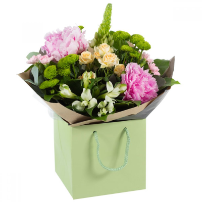 Pastel Garden Breeze - Soft, airy, and effortlessly elegant, Pastel Garden Breeze brings the beauty of a gentle spring morning indoors. Featuring a delicate blend of plush pinks, Peonies, creamy yellows, and fresh greenery, this bouquet captures the lightness and charm of a blooming spring garden. Perfect for birthdays, thank-you gifts, or brightening any home with subtle seasonal colour. 

Beautifully wrapped and presented in a water filled gift box. 

Please note images are examples only, flowers used may vary due to seasonal availability.